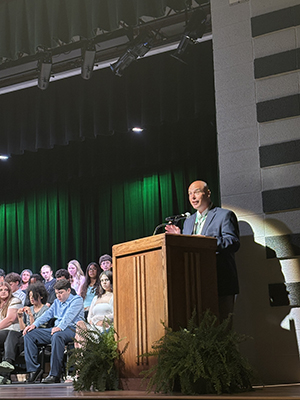 Superintendent speaking at graduation
