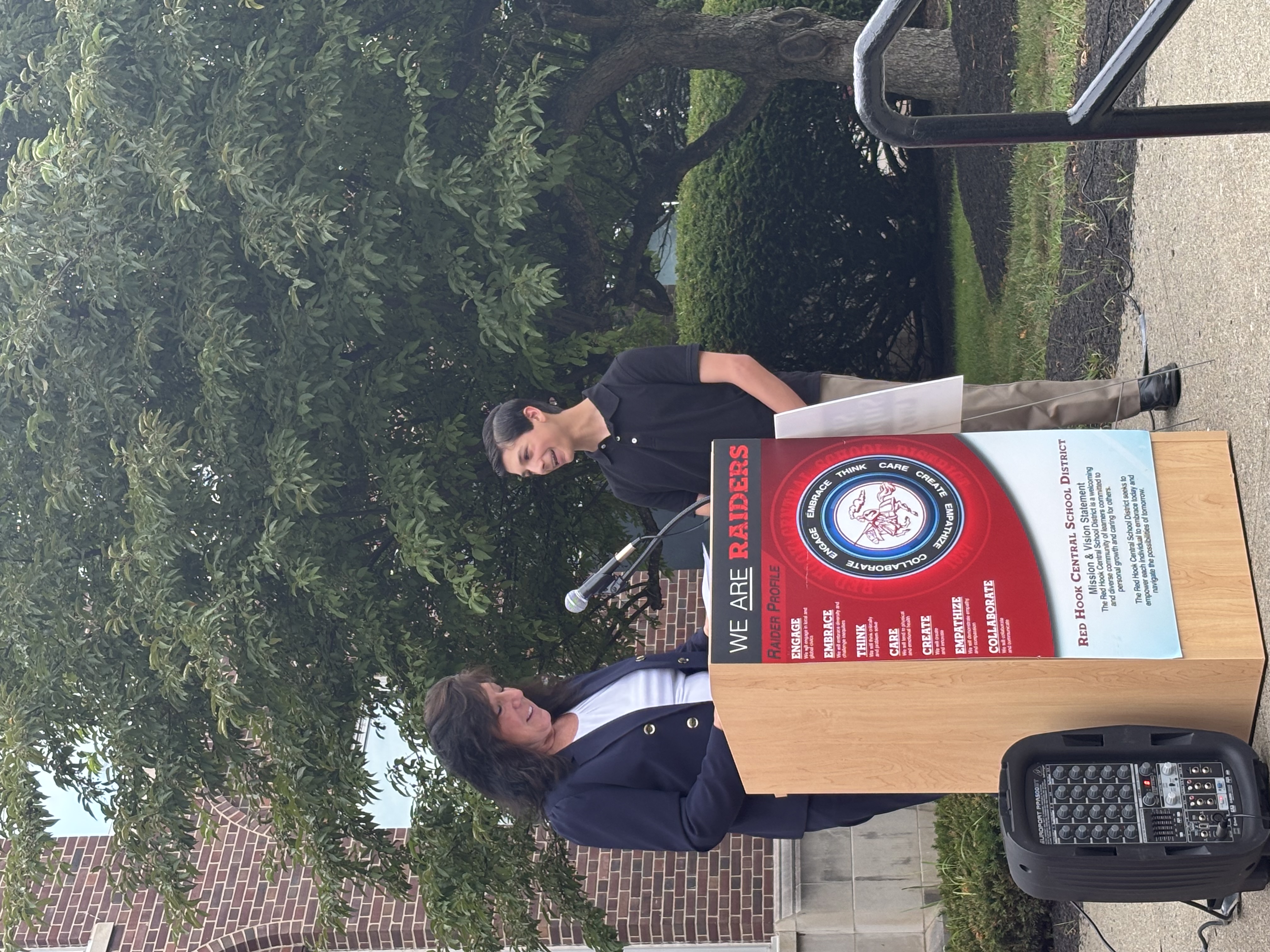 Sue Serino presenting certificate to honoree