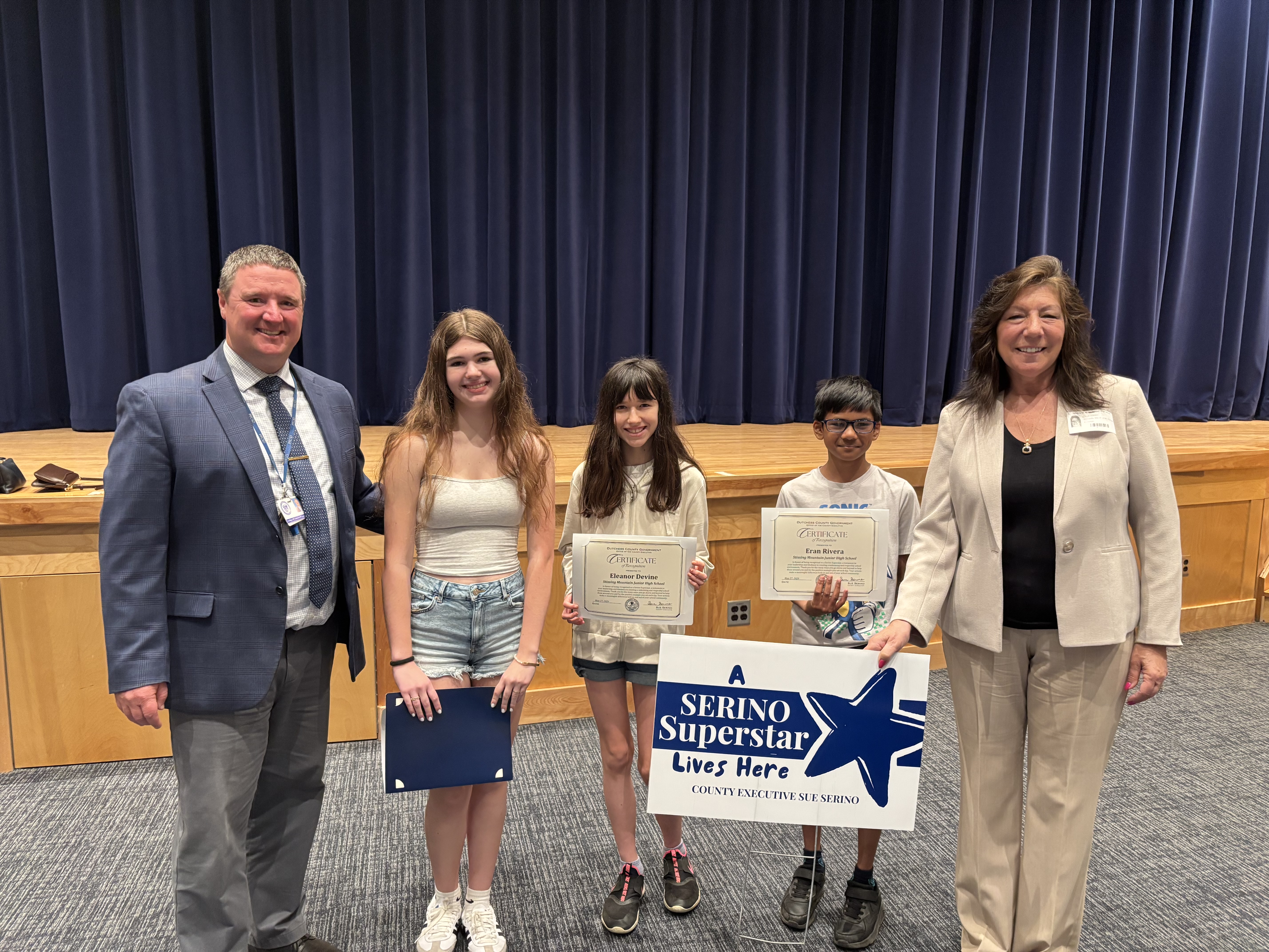 County Executive Sue Serino and Stissing principal taking picture with all the honorees