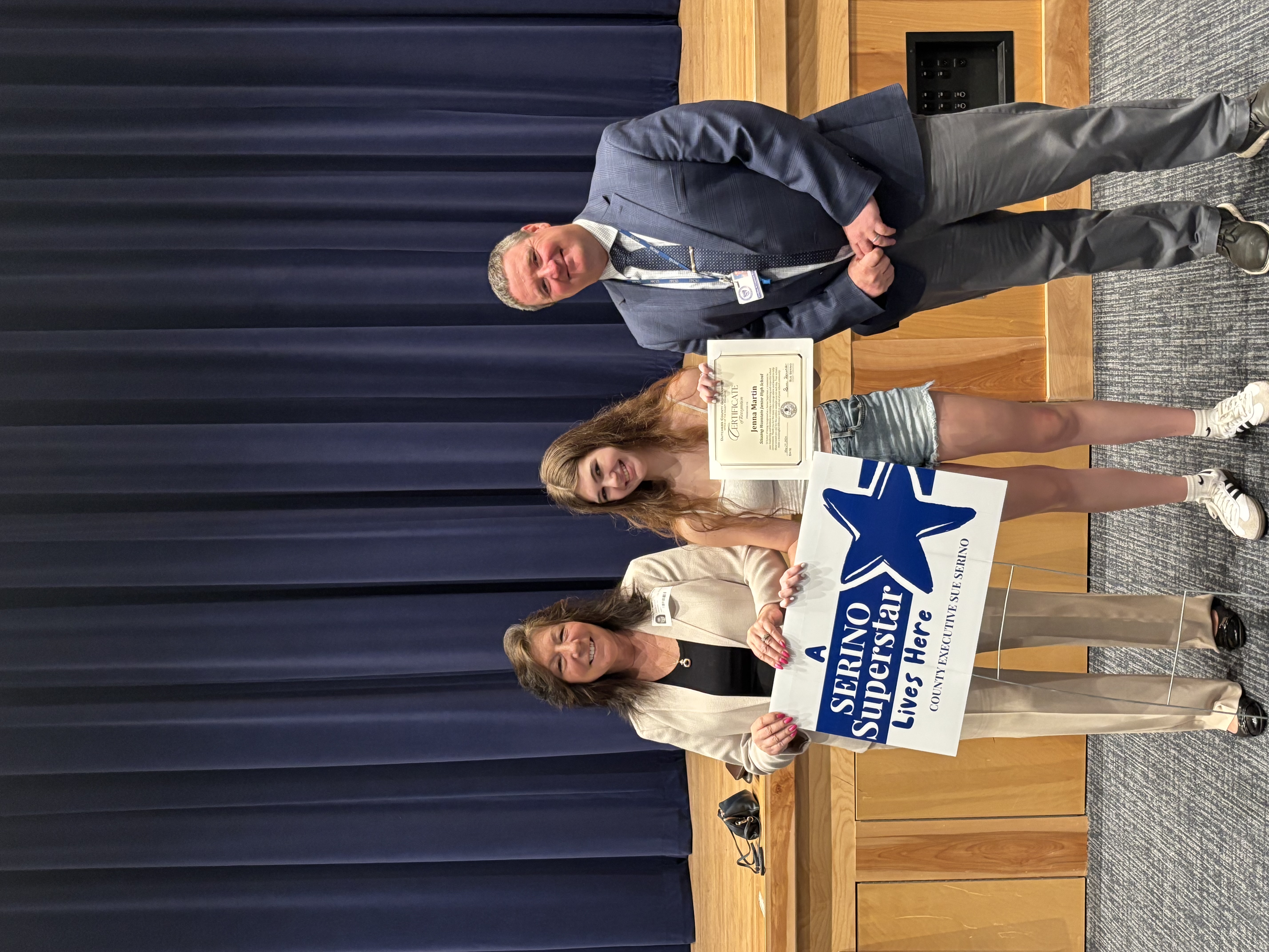 County Executive Sue Serino and Stissing principal taking picture with honoree