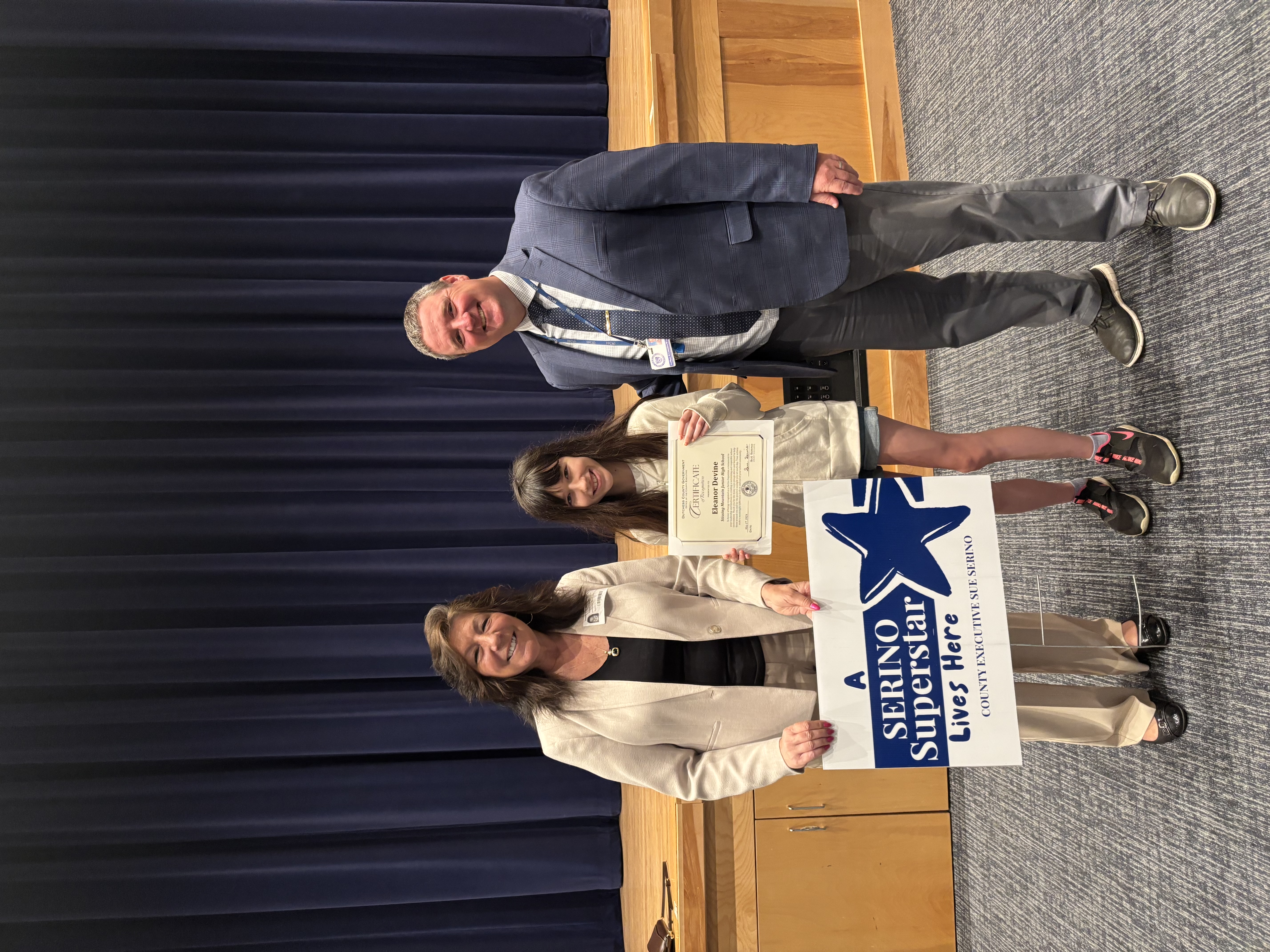 County Executive Sue Serino and Stissing principal taking picture with honoree