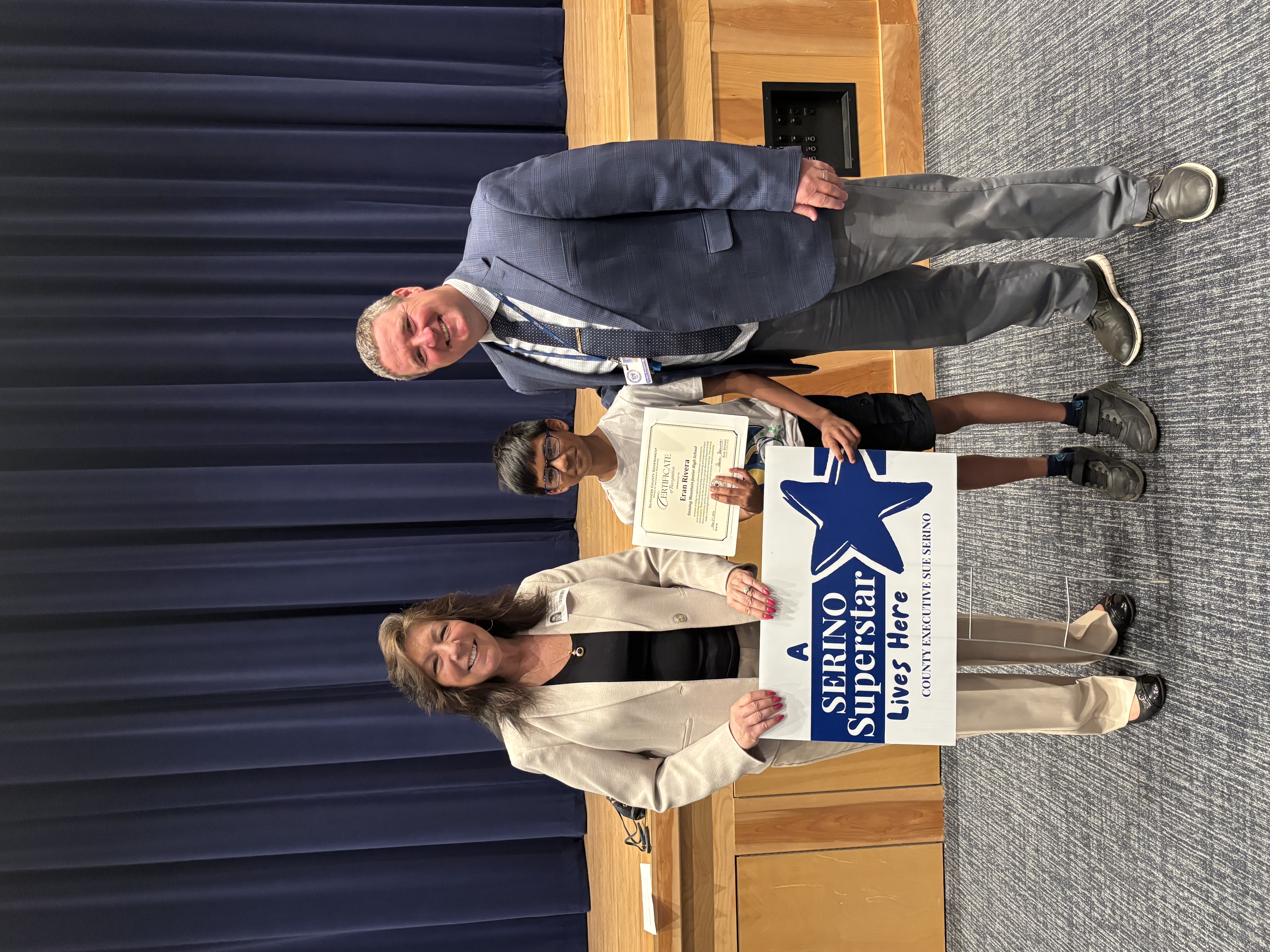 County Executive Sue Serino and Stissing principal taking picture with honoree