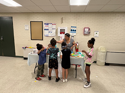 Children working around a craft table