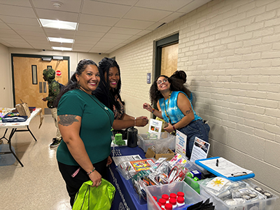 People smiling, getting information 