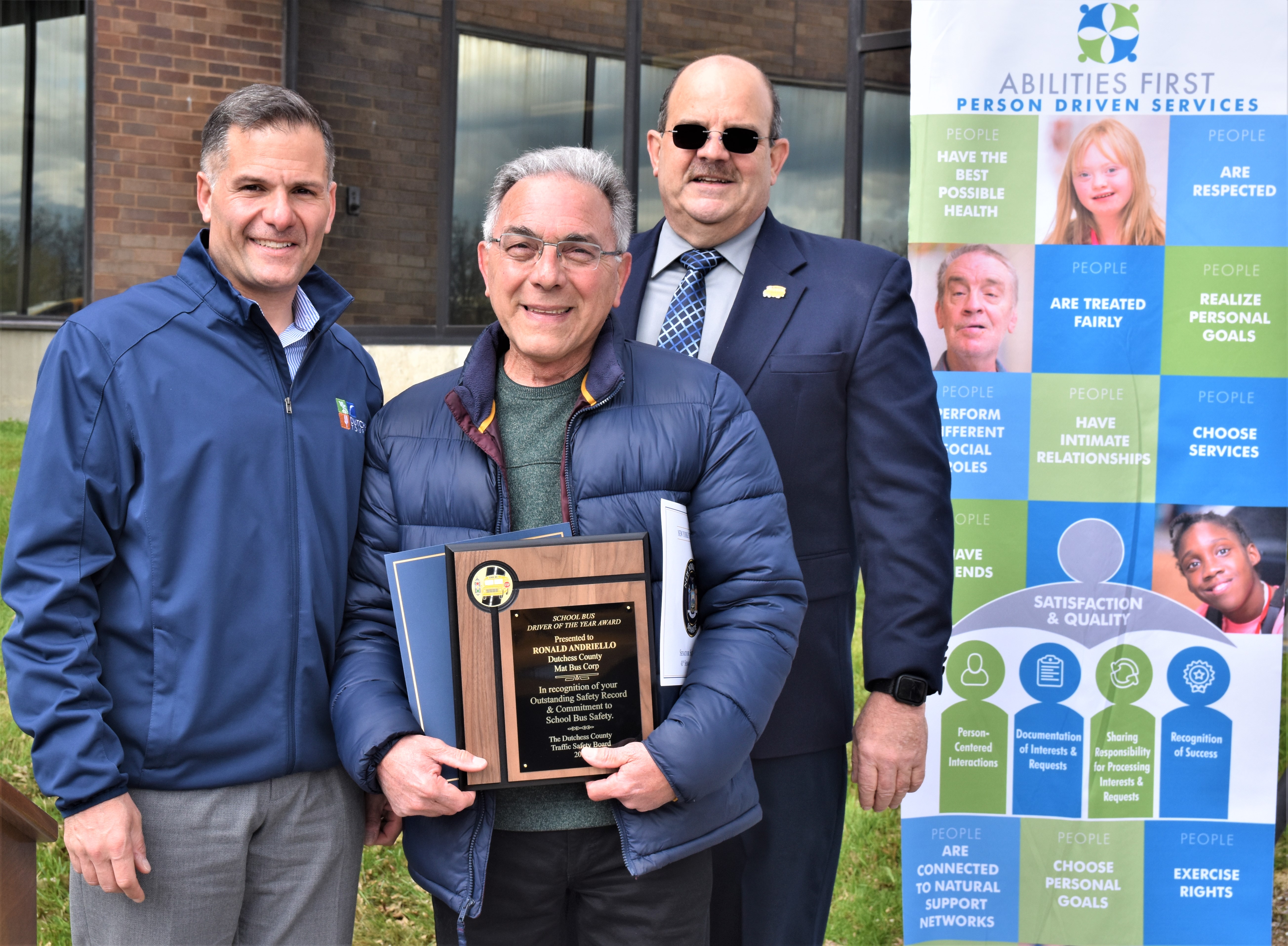 Ronald Andriello, middle, 2022 School Bus Driver of the Year, from Total Transportation