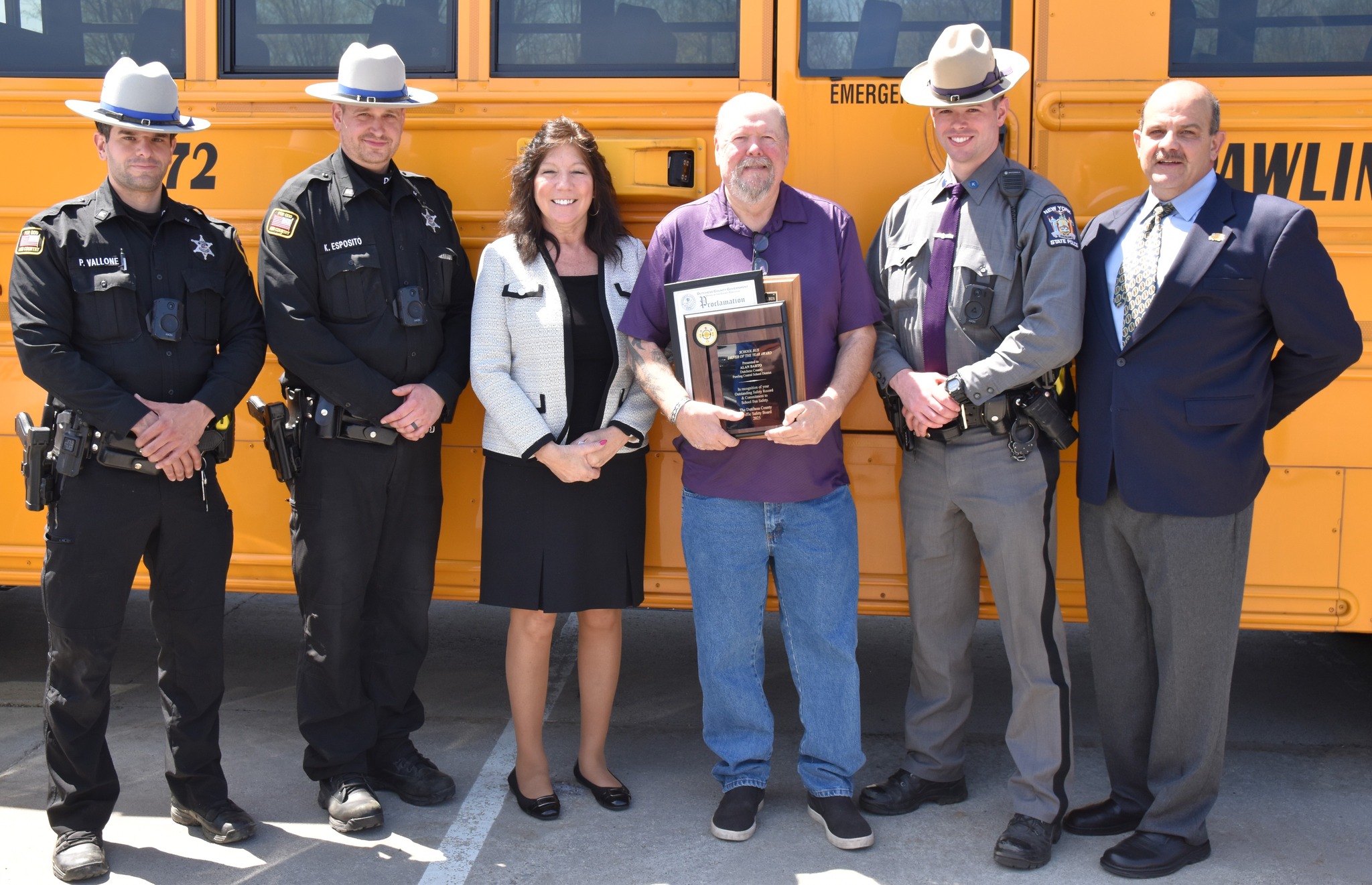 Image of Deputies, Sue Serino, Alan Barto, State Trooper, and Bill Johnson at 2025 School Bus Driver of the Year presentation