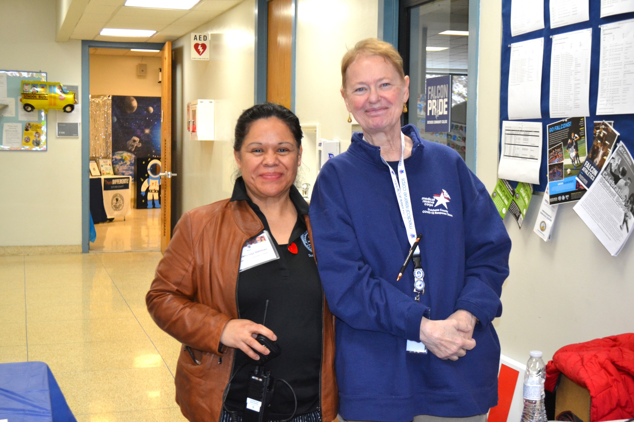 two people posing at health fair