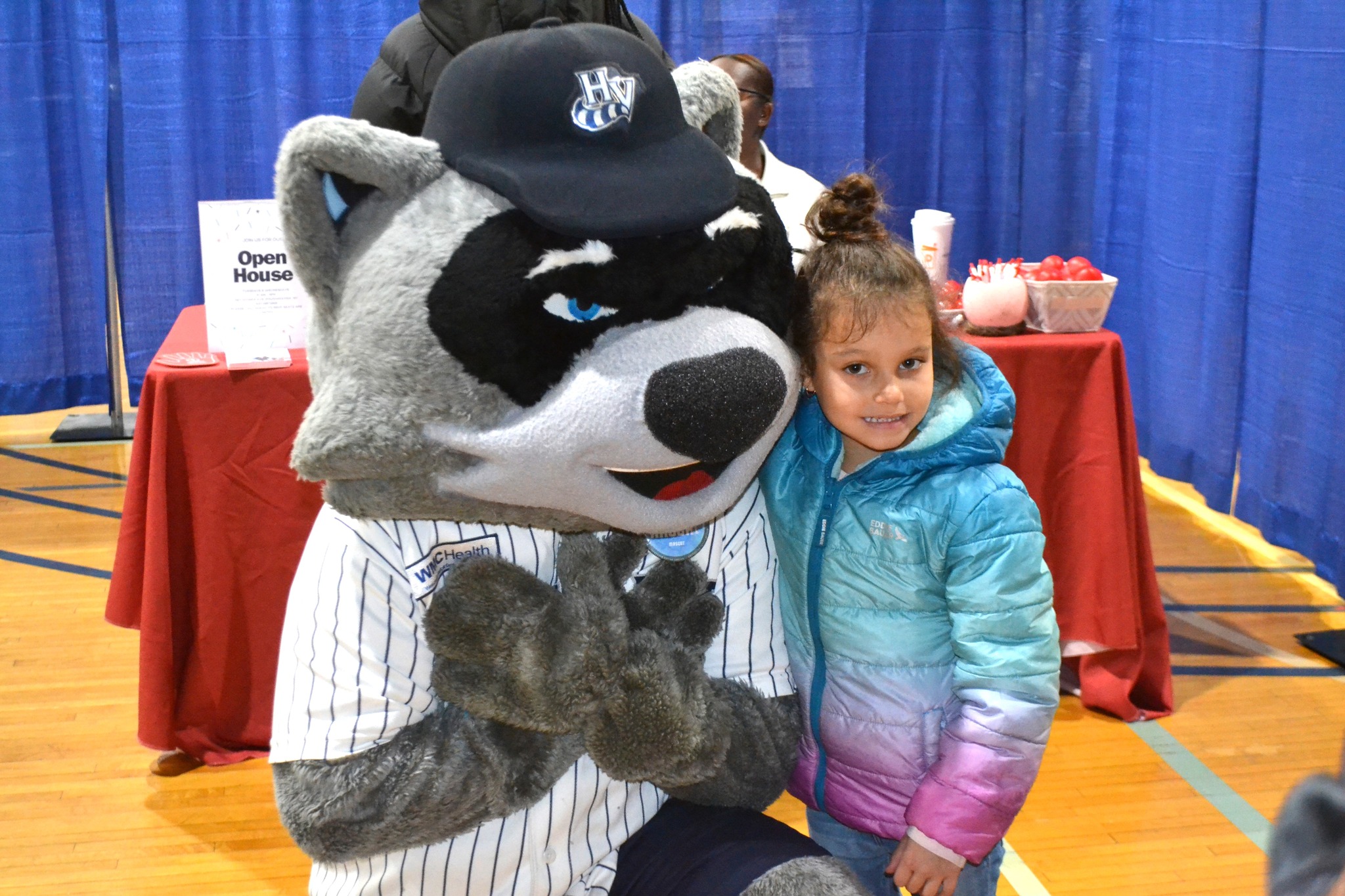 Child with Raccoon mascot